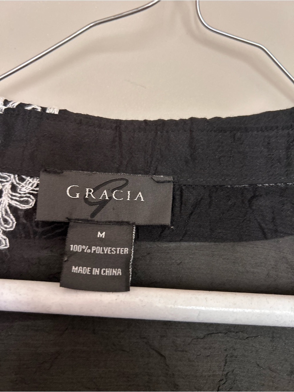 Gracia Black Top with White Floral Stitching